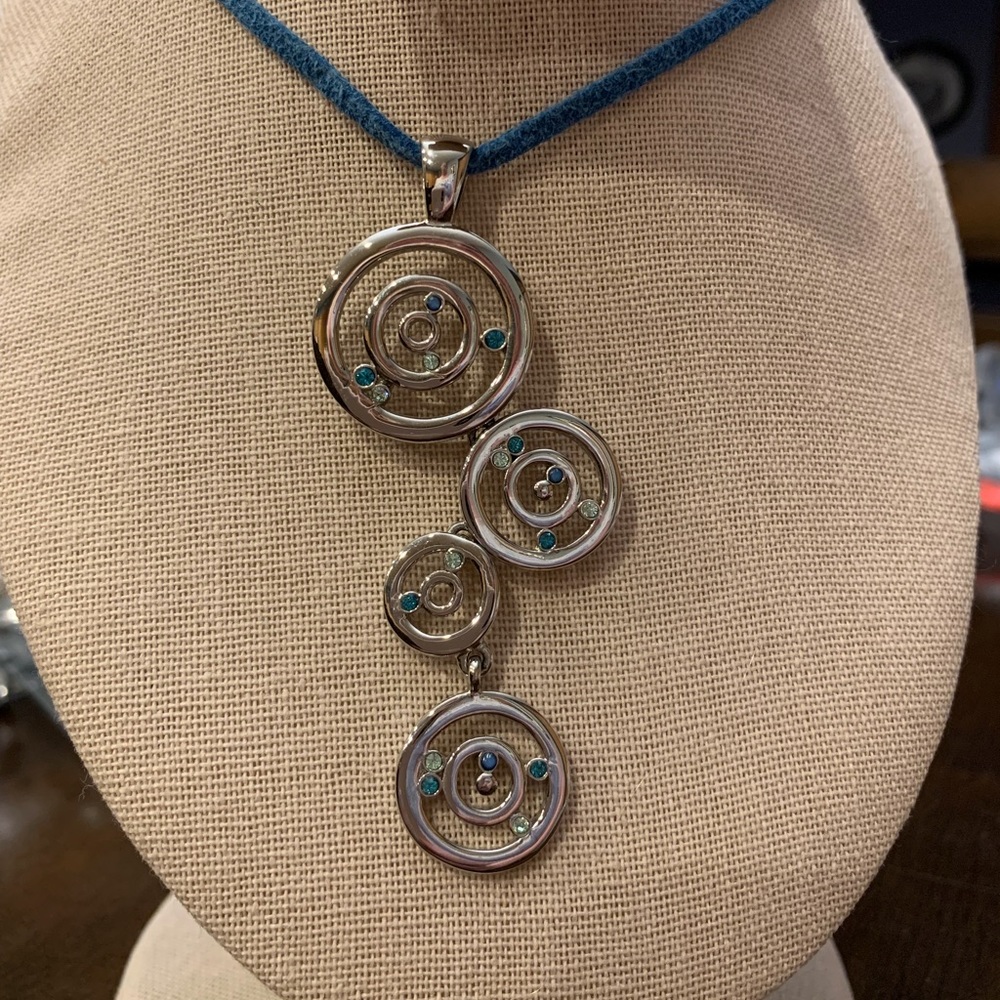 Lia Sophia silver toned circles pendant with blue stones